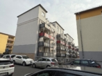 Rückansicht, Balkone - Zentral. Vermietet. Wertstabil.