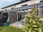 Terrasse Blick Wohnzimmer - Modern. Effizient. Zuhause. KFW55 Standard.