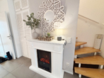 E-Kamin Impression - Modern. Effizient. Zuhause. KFW55 Standard.